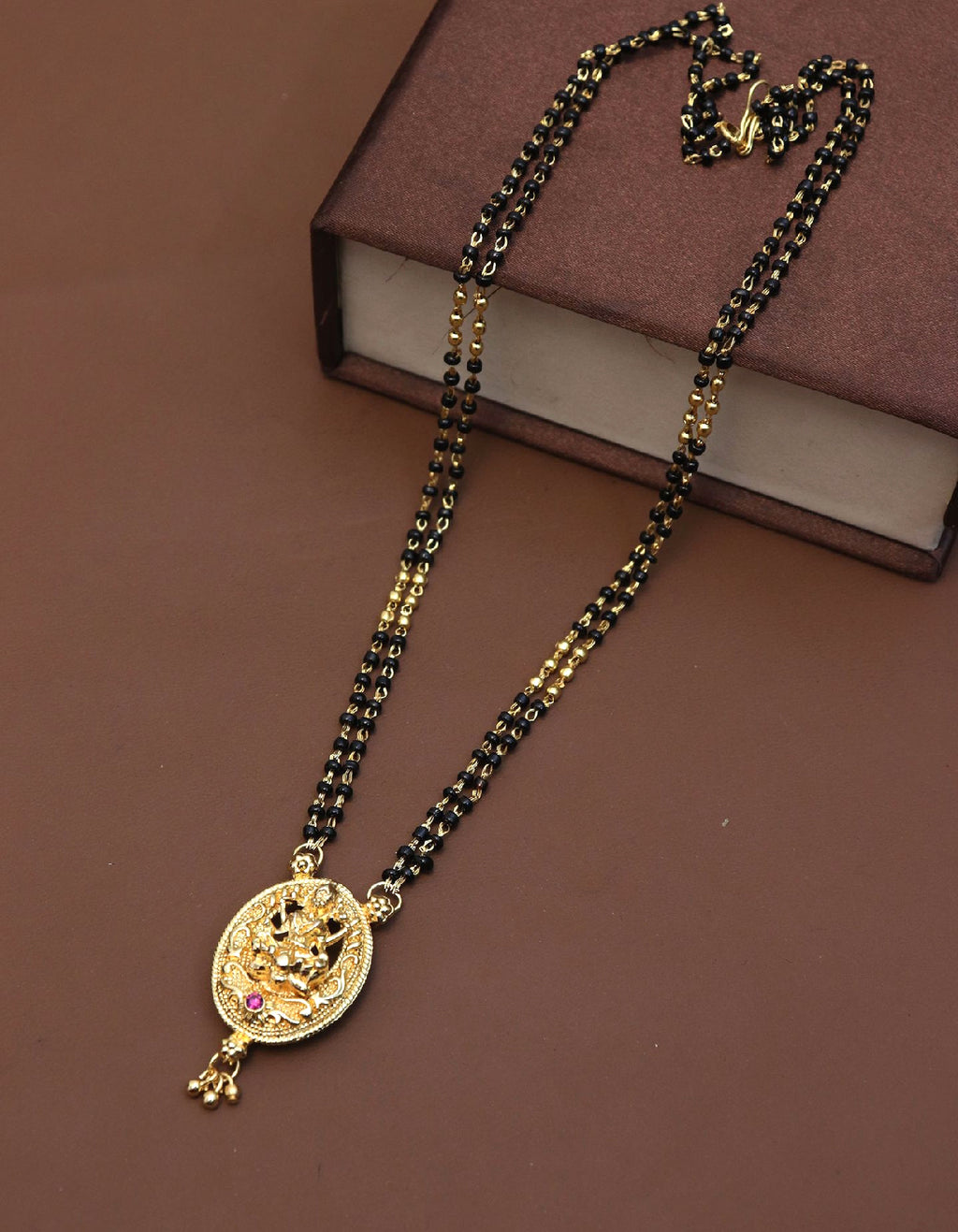Jewels Kafe Lakshmi Pendant With Moti Gold Black Beads Mangalsutra