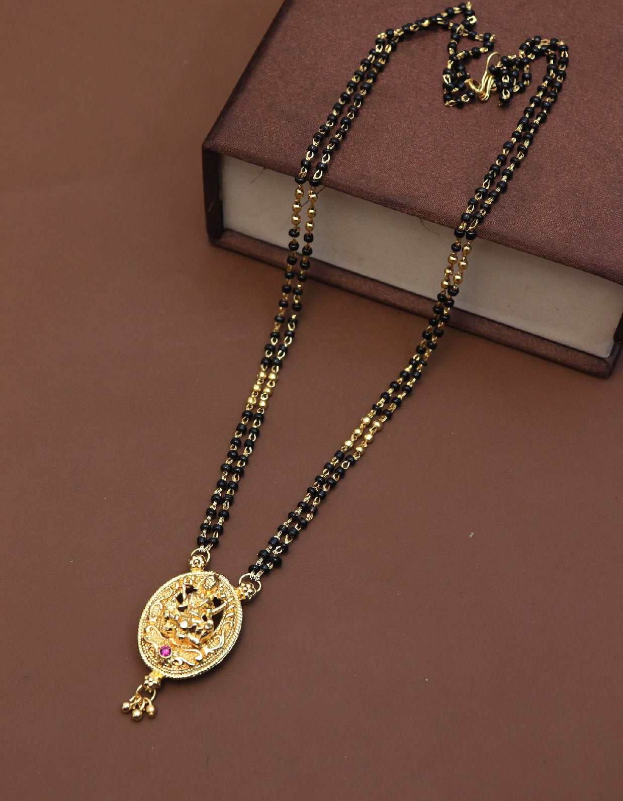 Jewels Kafe Lakshmi Pendant With Moti Gold Black Beads Mangalsutra