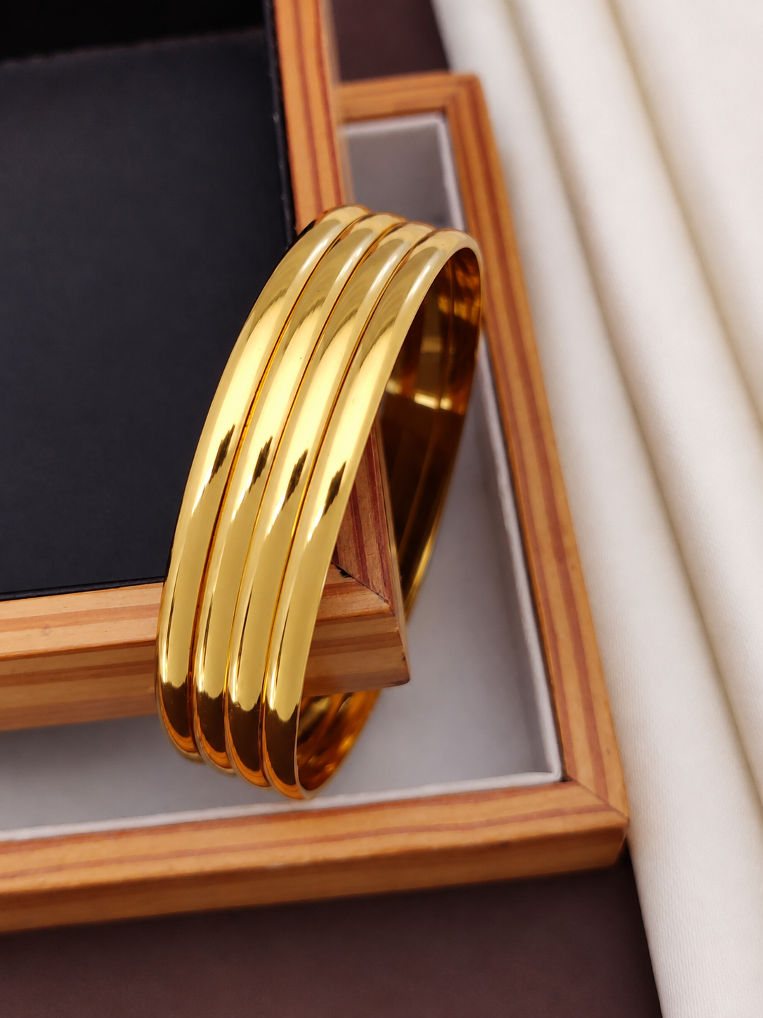 Jewels Kafe Premium Anti-Tarnish Golden Bangles Set of 4 2.10
